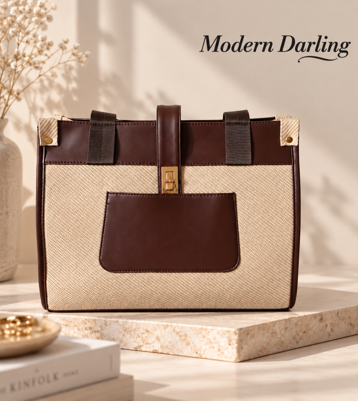Hazel Tote Bag in Coffee - front view with exterior pocket and gold clasp