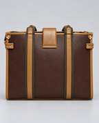Modern Work Tote back view in red wine with tan leather trim, dual vertical straps, textured body and gold-tone side hardware